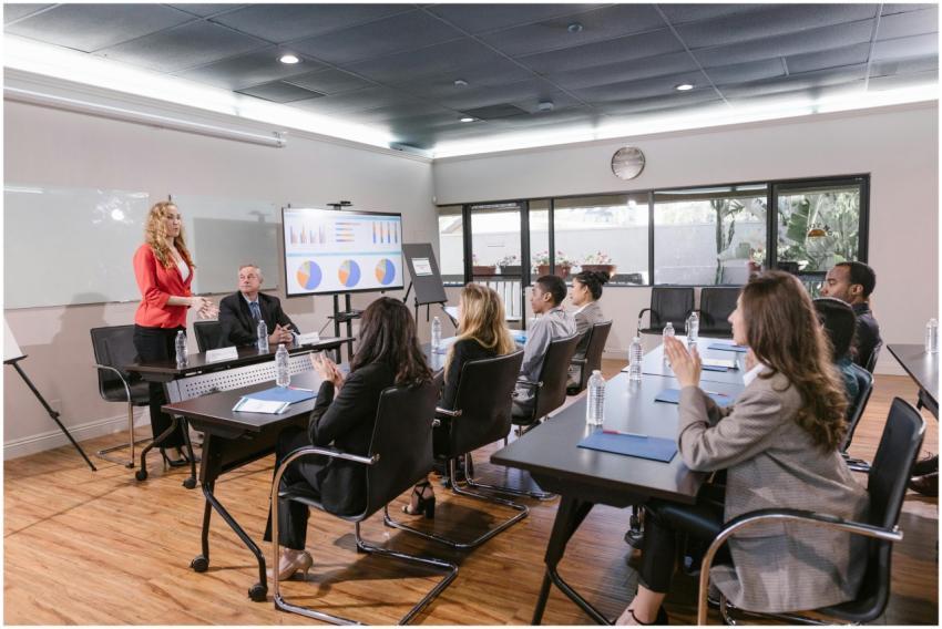 Business professionals attending a meeting in a mo