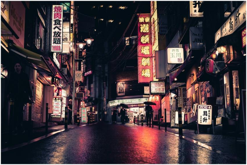 Neon-lit street in Tokyo showcasing urban nightlif