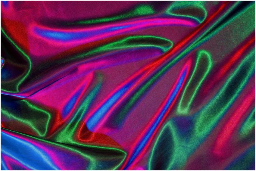 Colorful satin fabric with shimmering abstract rip