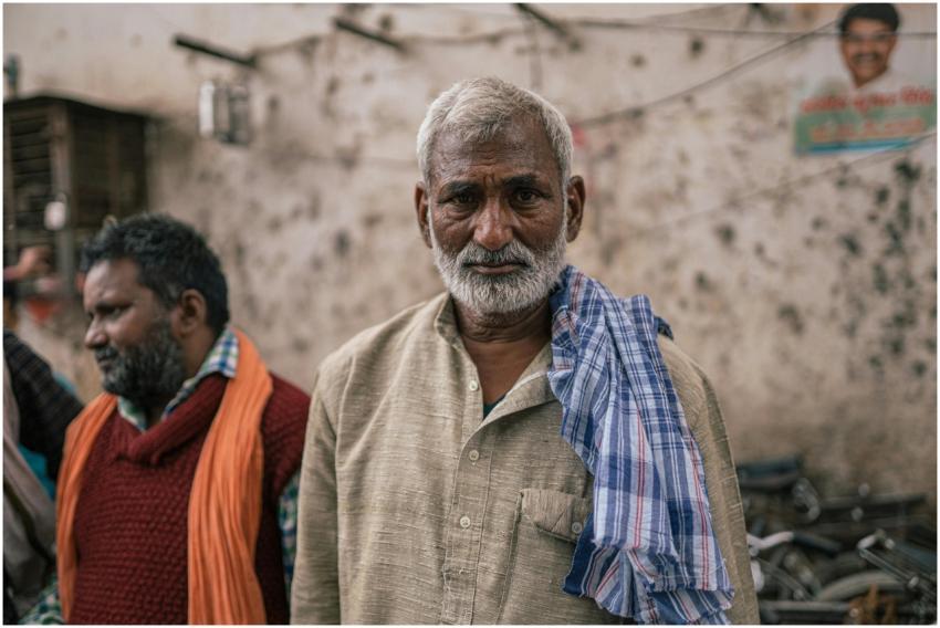 Candid portrait of an elderly man in Varanasi's bu