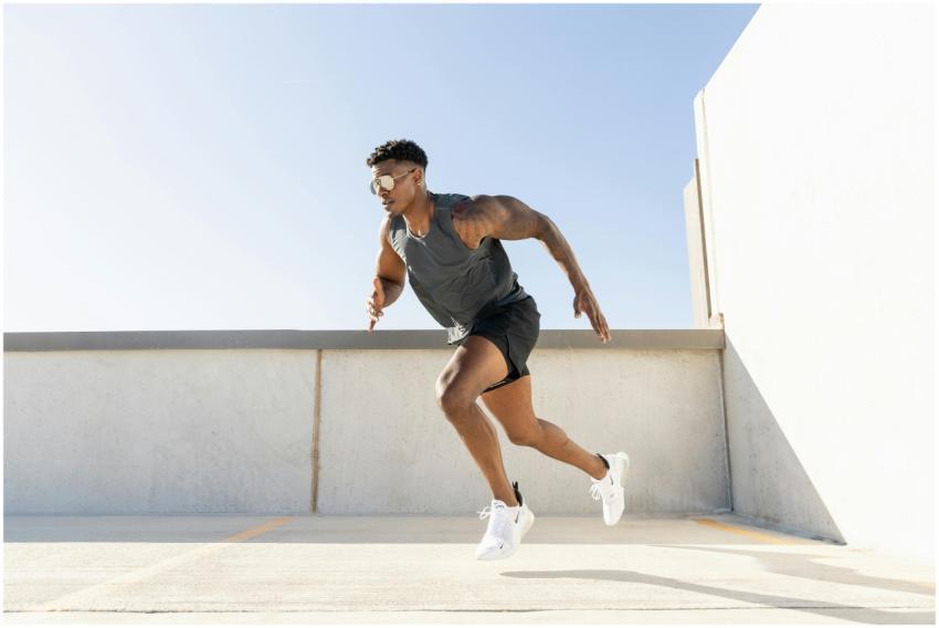 Dynamic image of a man sprinting on a building roo