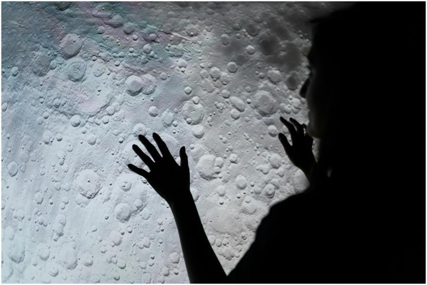 A mysterious silhouette of a woman interacting wit