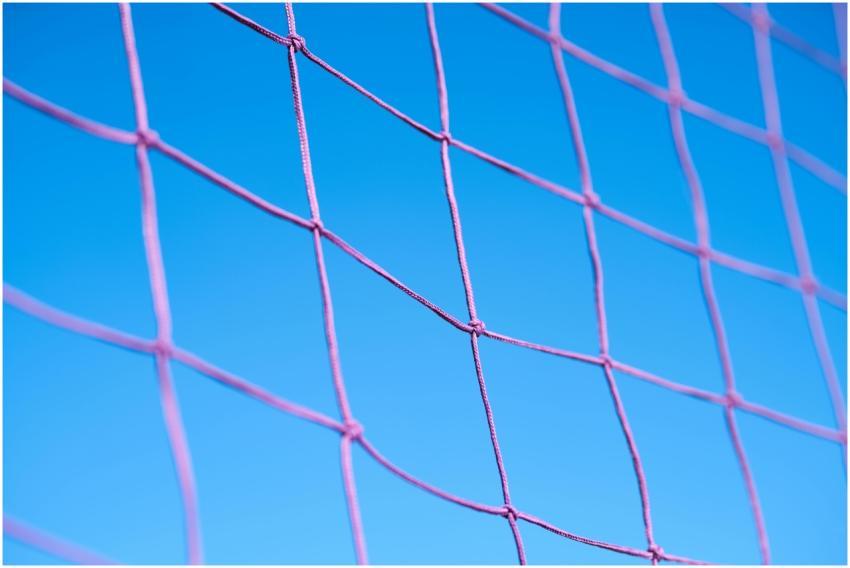 Close-up of a pink volleyball net pattern against