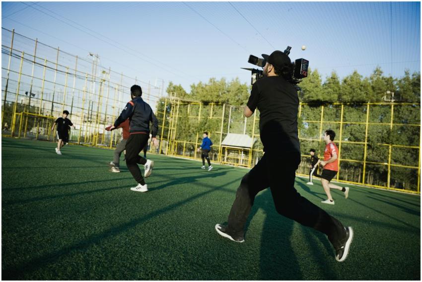 A dynamic scene of a camera crew capturing an inte