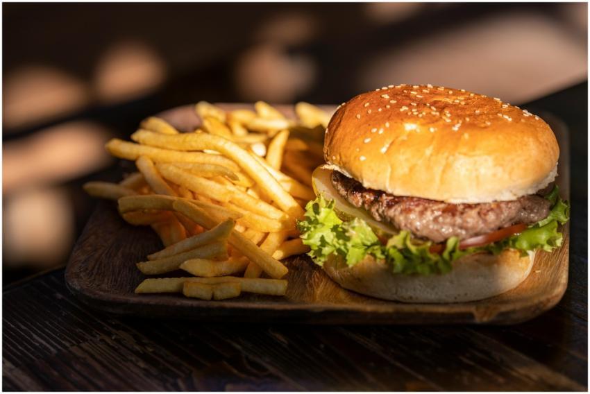 Mouthwatering burger with golden french fries, per