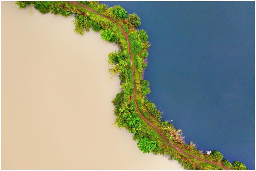 Aerial view of contrasting water bodies separated