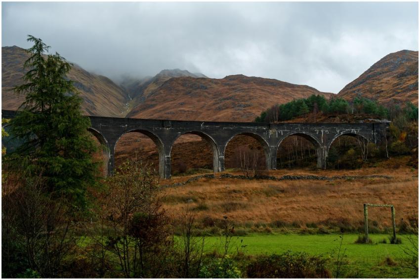 A scenic view of the Glenfinnan Viaduct amidst mis
