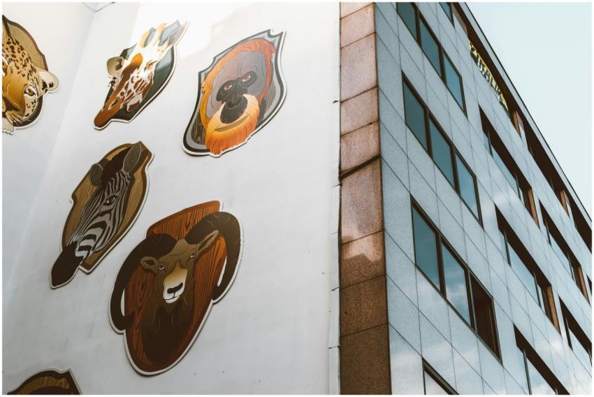 Creative animal mural displayed on the side of a c