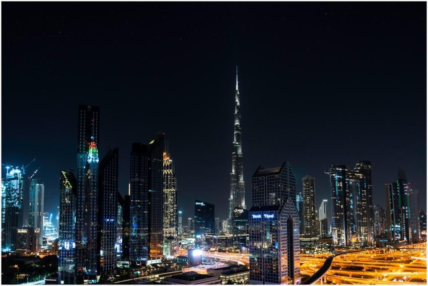 Stunning nighttime view of Dubai's skyline with th