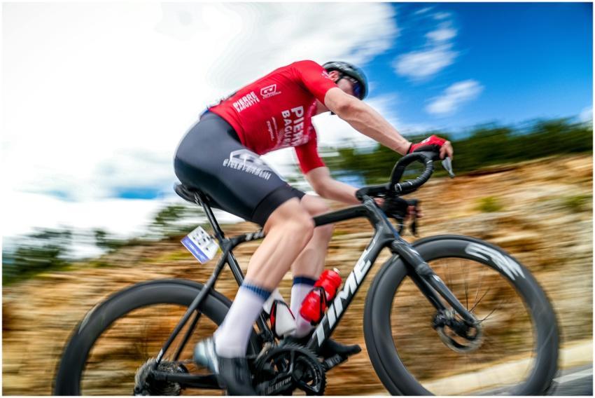 Dynamic shot of a cyclist racing on a mountain roa