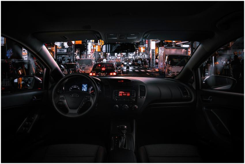View from car interior at night in Tokyo, featurin
