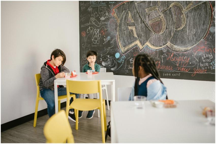 Diverse group of children in a classroom setting i