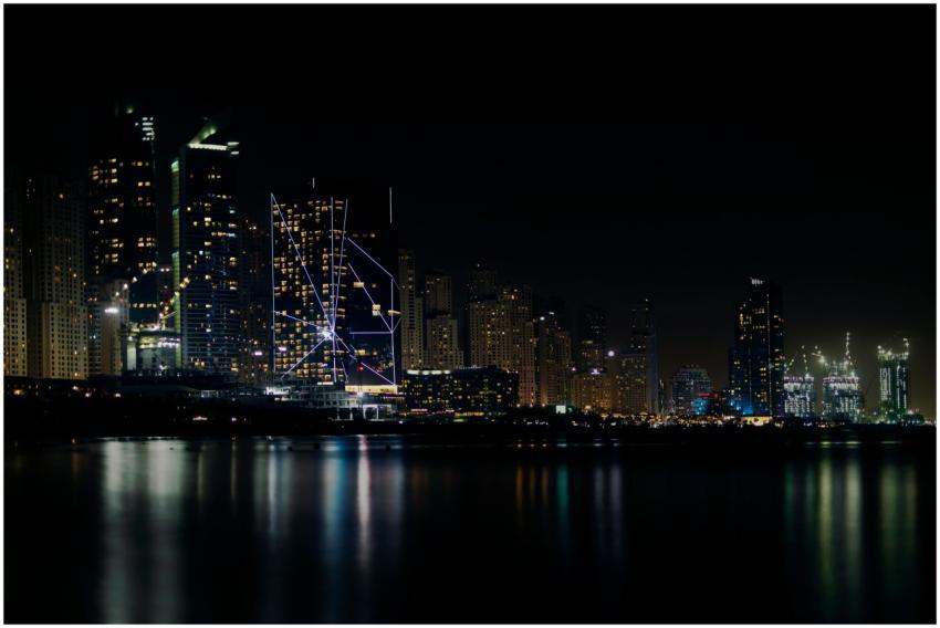 Captivating night view of Dubai's skyline reflecti