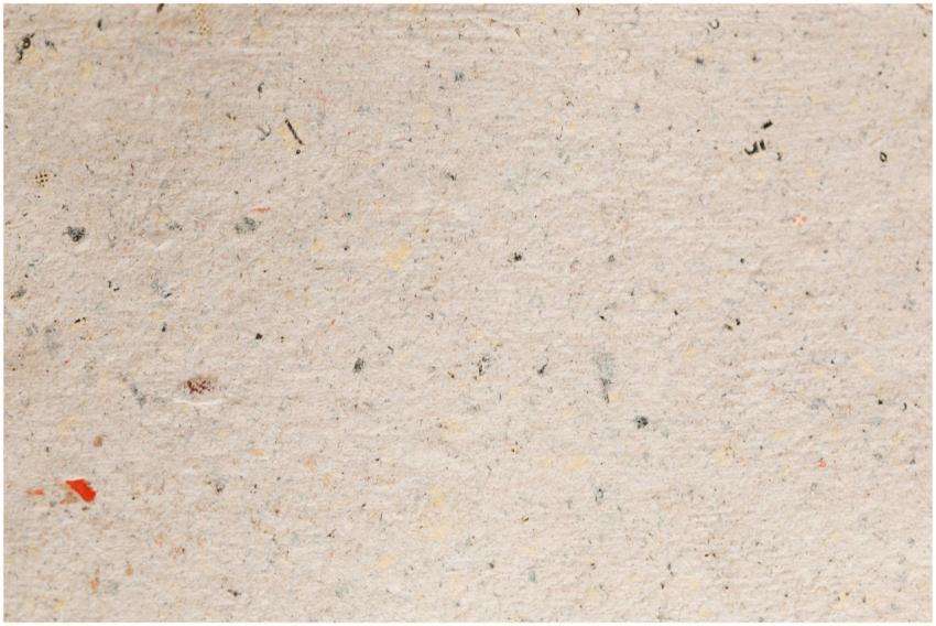 Close-up texture of recycled paper, featuring natu