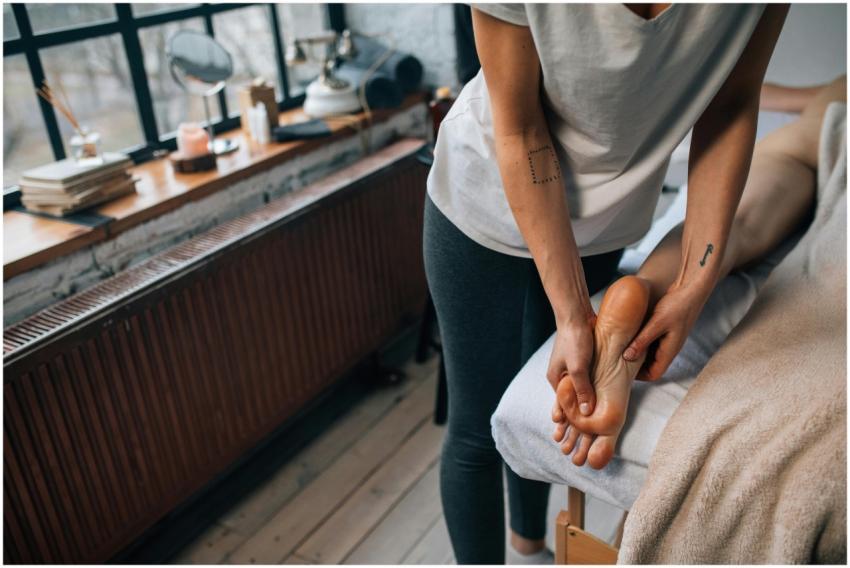 Professional foot massage in a serene and cozy ind