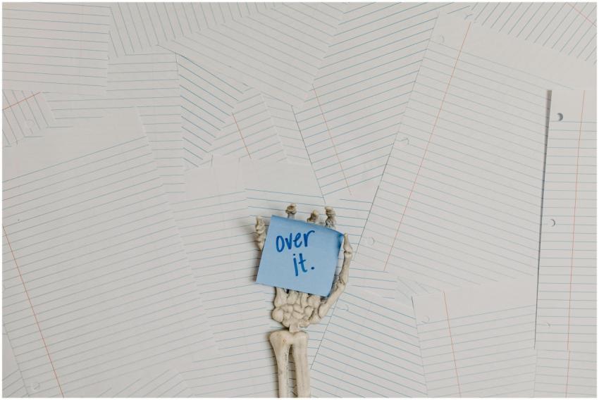 Artistic depiction of burnout with a skeleton hand