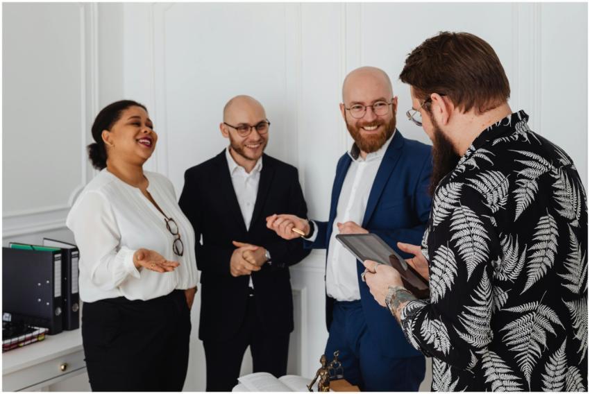 A diverse group of business professionals smiling
