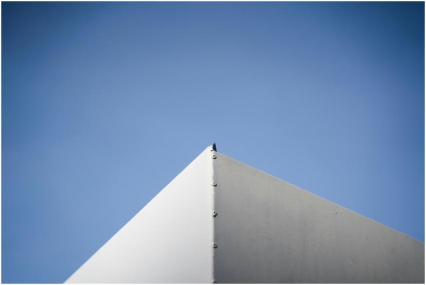 A minimalist architectural corner against a vivid