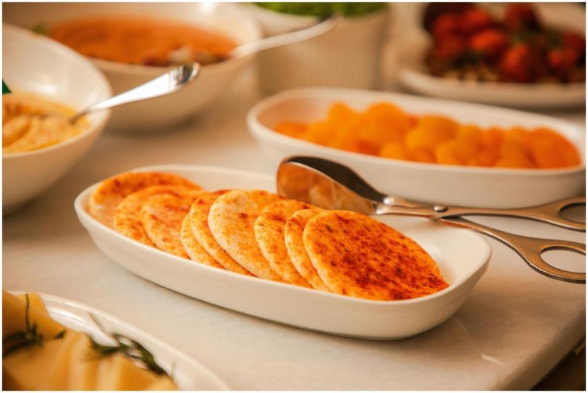 A selection of seasoned appetizers served on a buf