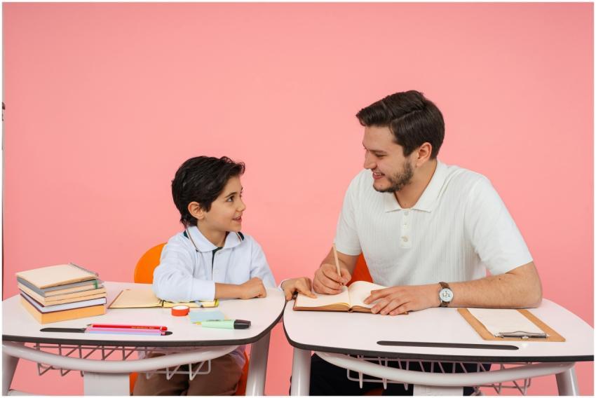 Teacher and young student engaged in study session