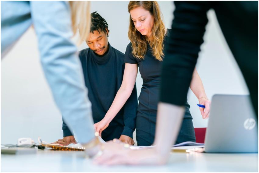 Business professionals engaged in a team meeting i