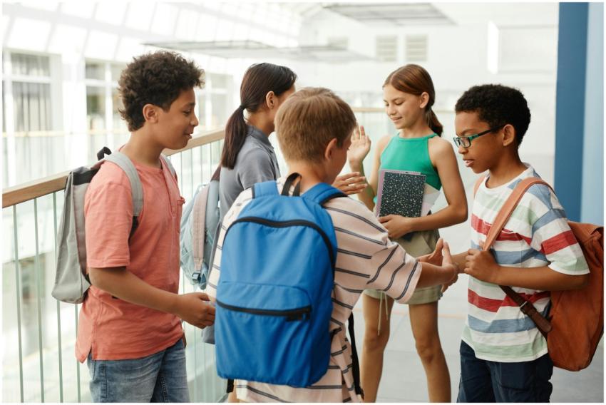 A diverse group of students interacting in a schoo