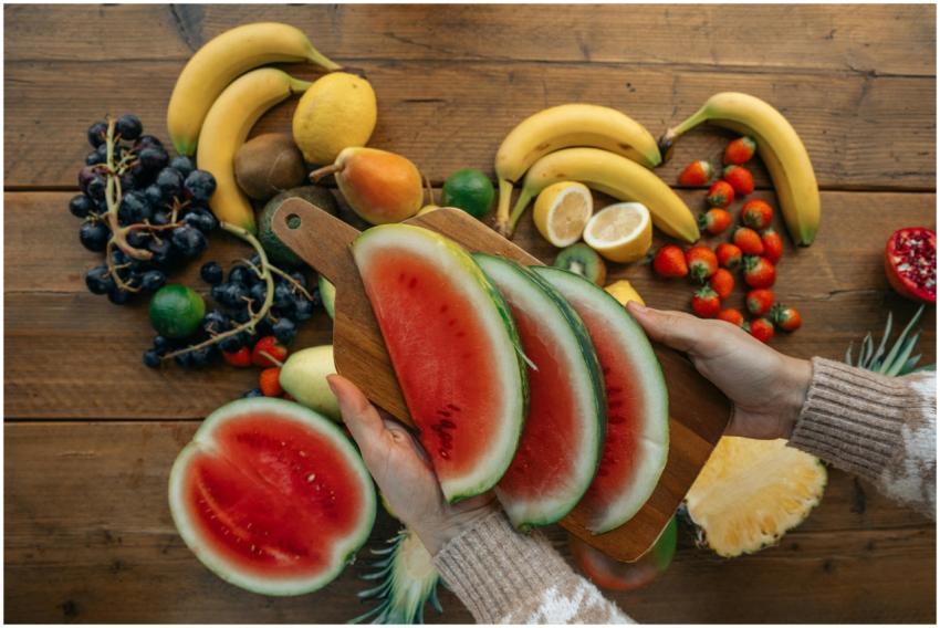 Close-up view of fresh watermelon slices and assor