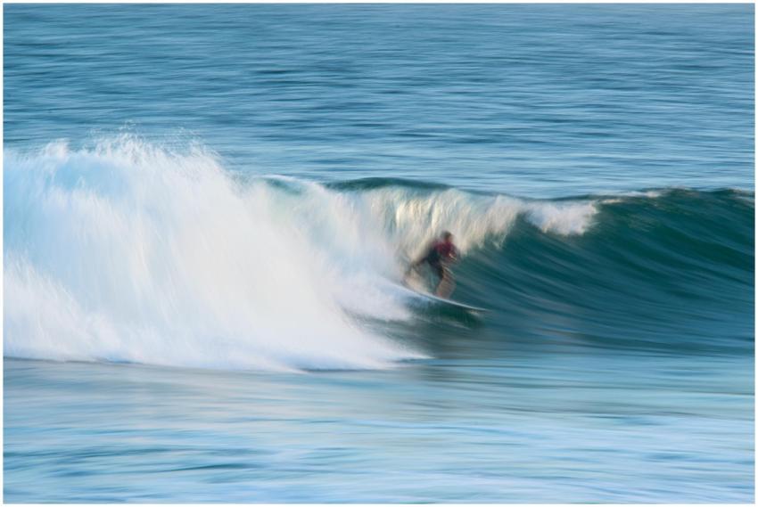 Exciting scene of a surfer riding the powerful wav