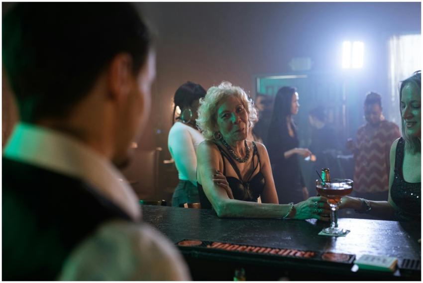 A lively bar scene with people enjoying drinks and