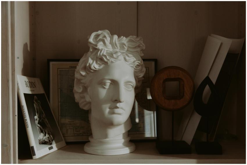 Artistic still life featuring a classical sculptur