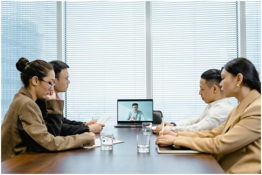 Professionals engage in a virtual business meeting