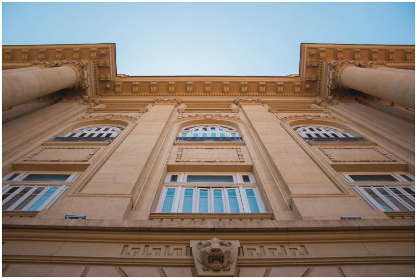 Low angle view of a neoclassical facade with ornat