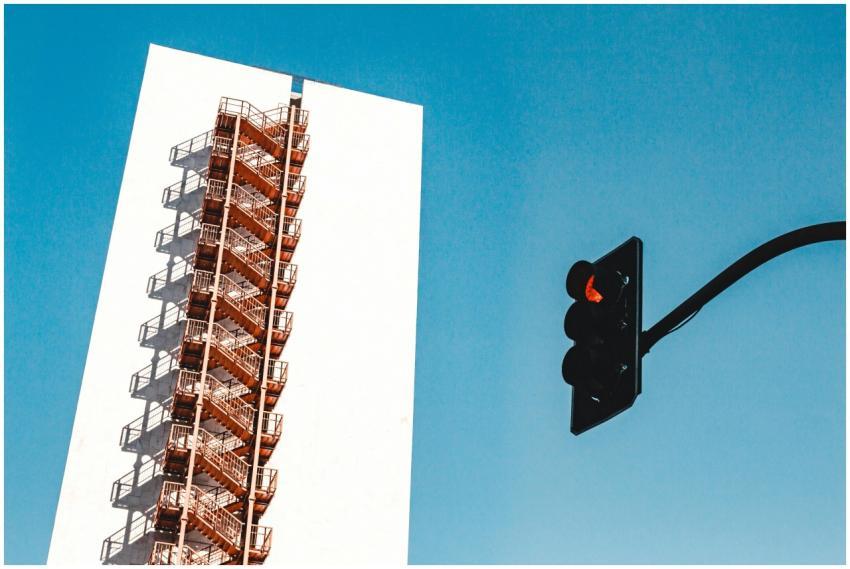 Modern urban building facade with fire escape and