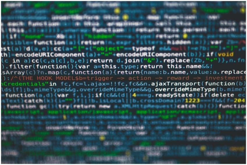 Detailed view of colorful programming code on a co