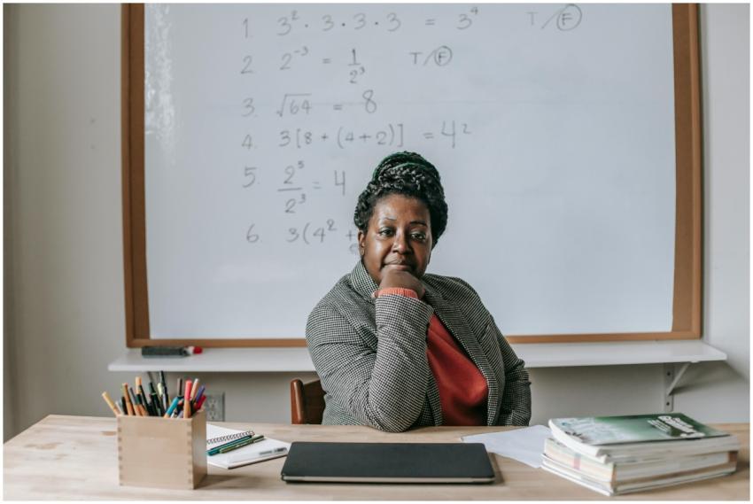 African American female teacher in formal clothes