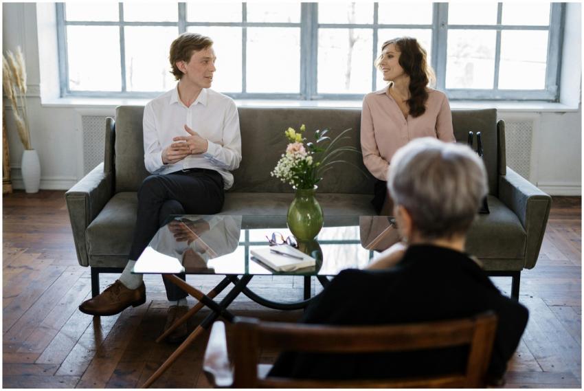 Couple engaged in a therapy session with a counsel