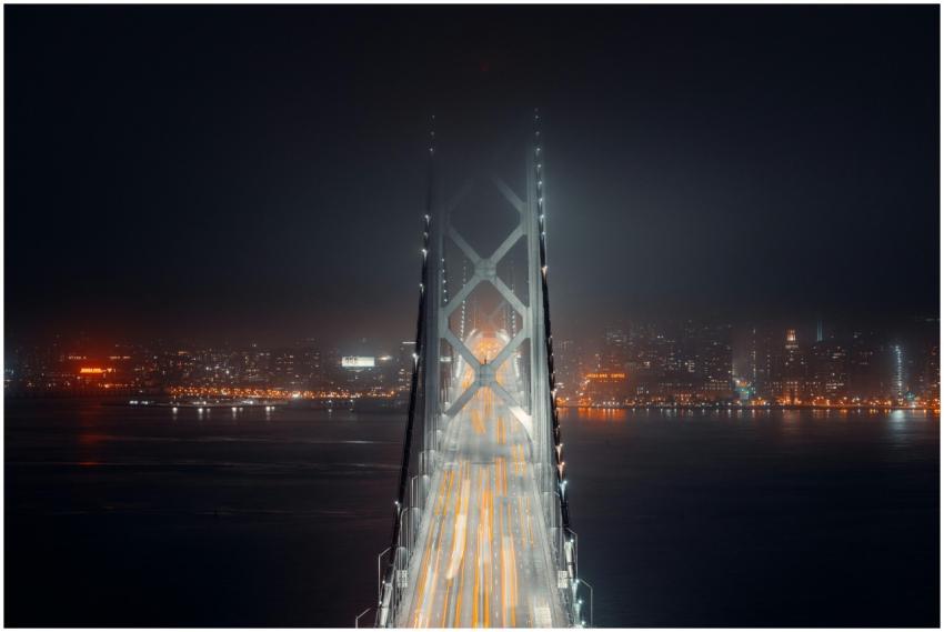 Modern suspension bridge with asphalt surface and