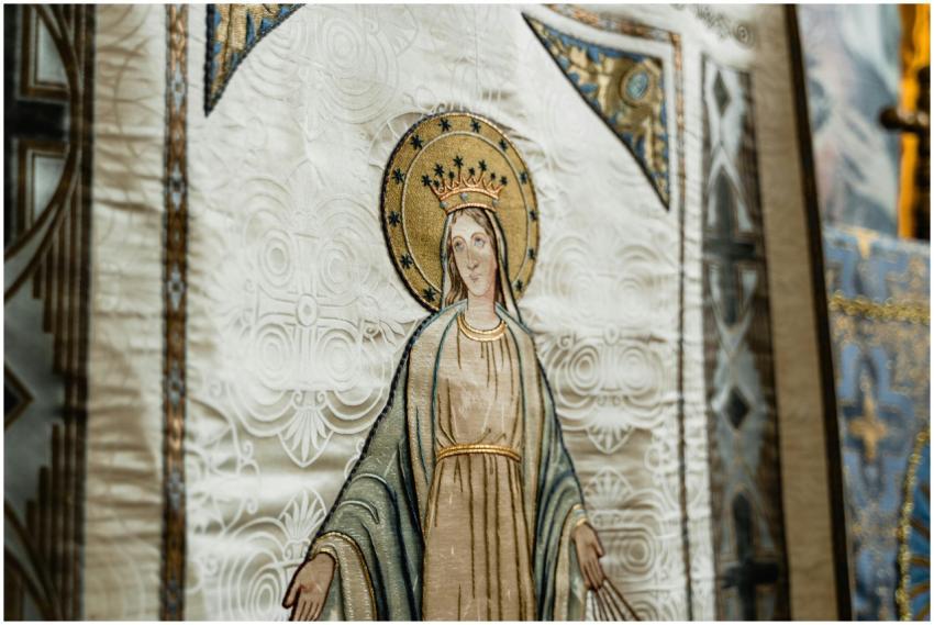 Close-up of a detailed religious tapestry depictin