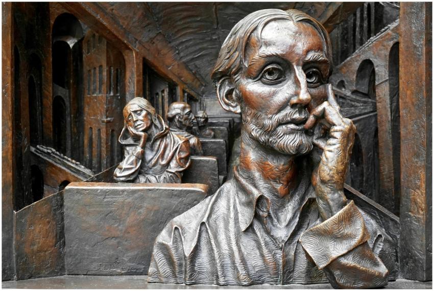 Detailed bronze artwork depicting thoughtful figur
