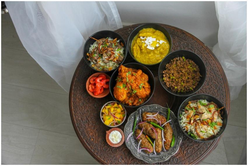 A vibrant array of Indian dishes with rice, curry,