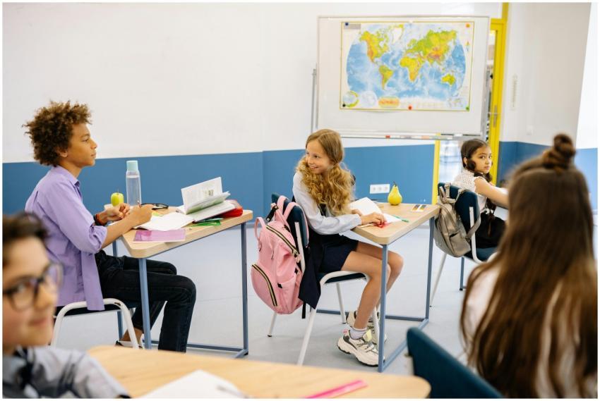 A group of diverse students in a modern classroom