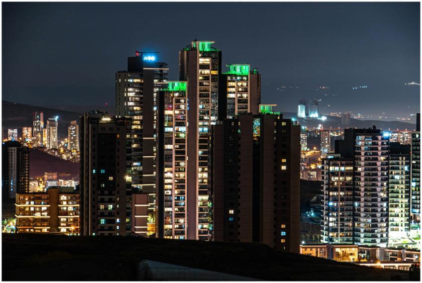 A stunning view of high-rise buildings illuminated