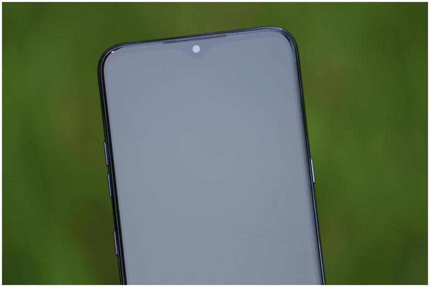 Close-up view of a smartphone screen with a green