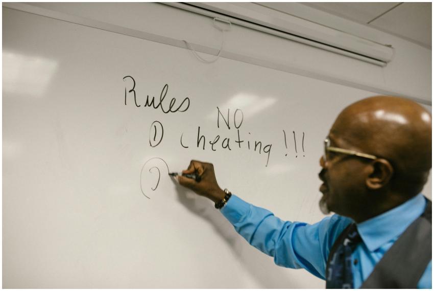Instructor highlighting classroom rules, emphasizi