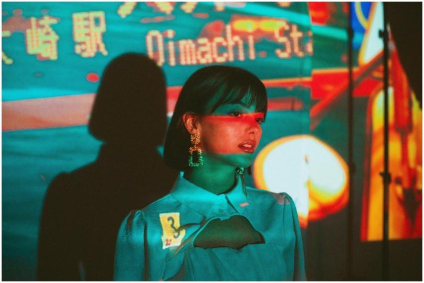 A colorful portrait featuring a woman with project