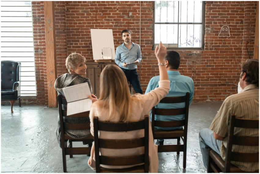Informal meeting with diverse adults discussing to