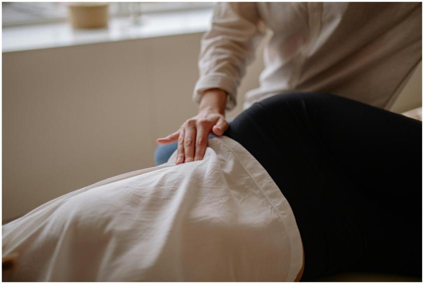 Close-up of a massage therapist performing a relax