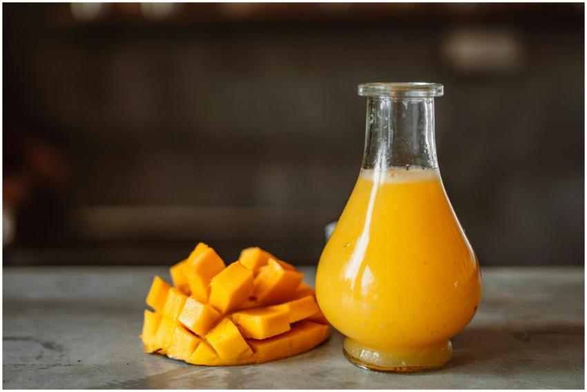 A refreshing and vibrant mango juice served in a c