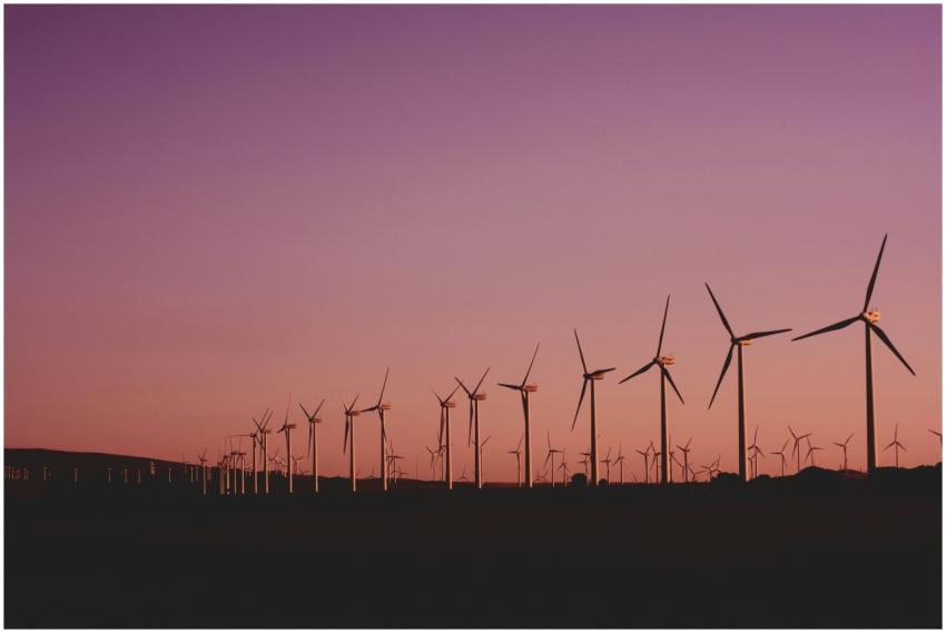Silhouetted wind turbines at sunset in Zahara de l