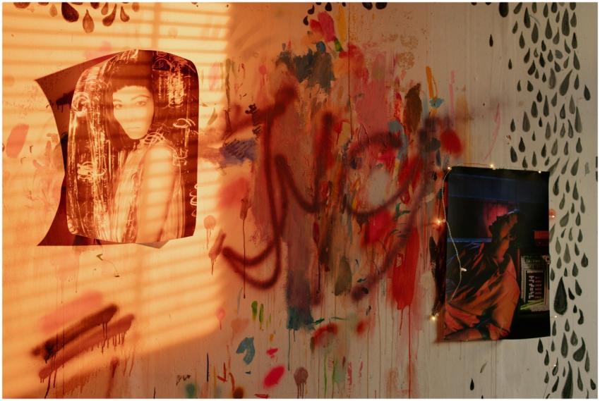 Vibrant wall art with graffiti and portrait poster